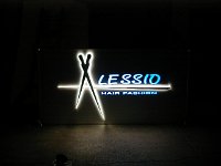 luminosa1  Insegna luminosa in alluminio anodizzato argento traforato con fuoriuscita di plexiglas da 20 mm intagliato a laser